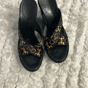 Gucci Black and Gold Sandals with Elegant Design